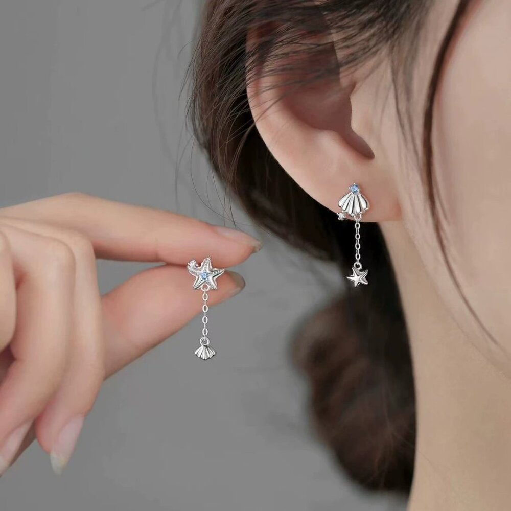 Silver Star And Shell Dangle Earrings - image 1
